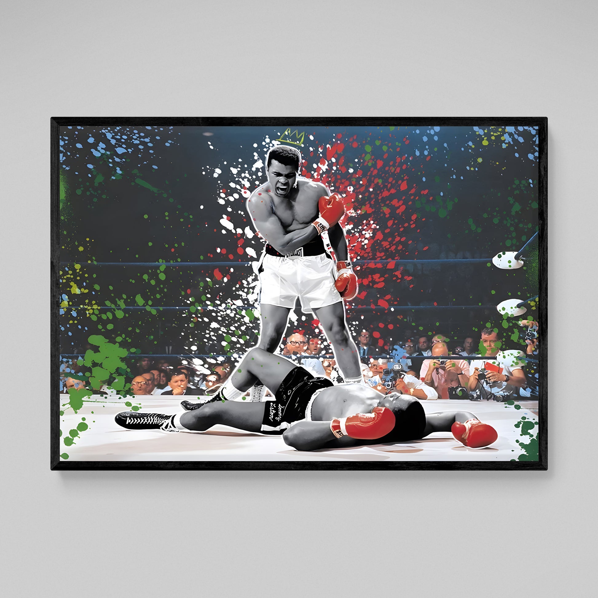 Cuadro Muhammad Ali: momento icónico del boxeo, efecto de salpicaduras de pintura vibrante, representa a Ali victorioso sobre su oponente.